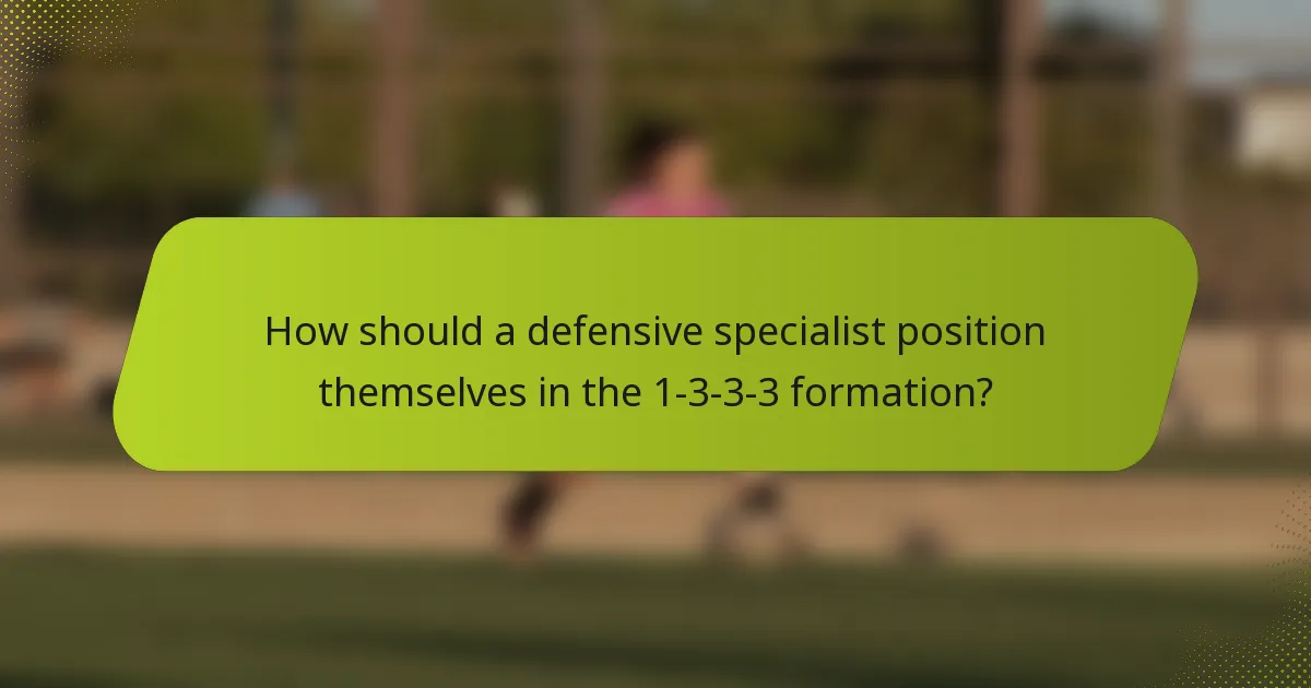 How should a defensive specialist position themselves in the 1-3-3-3 formation?